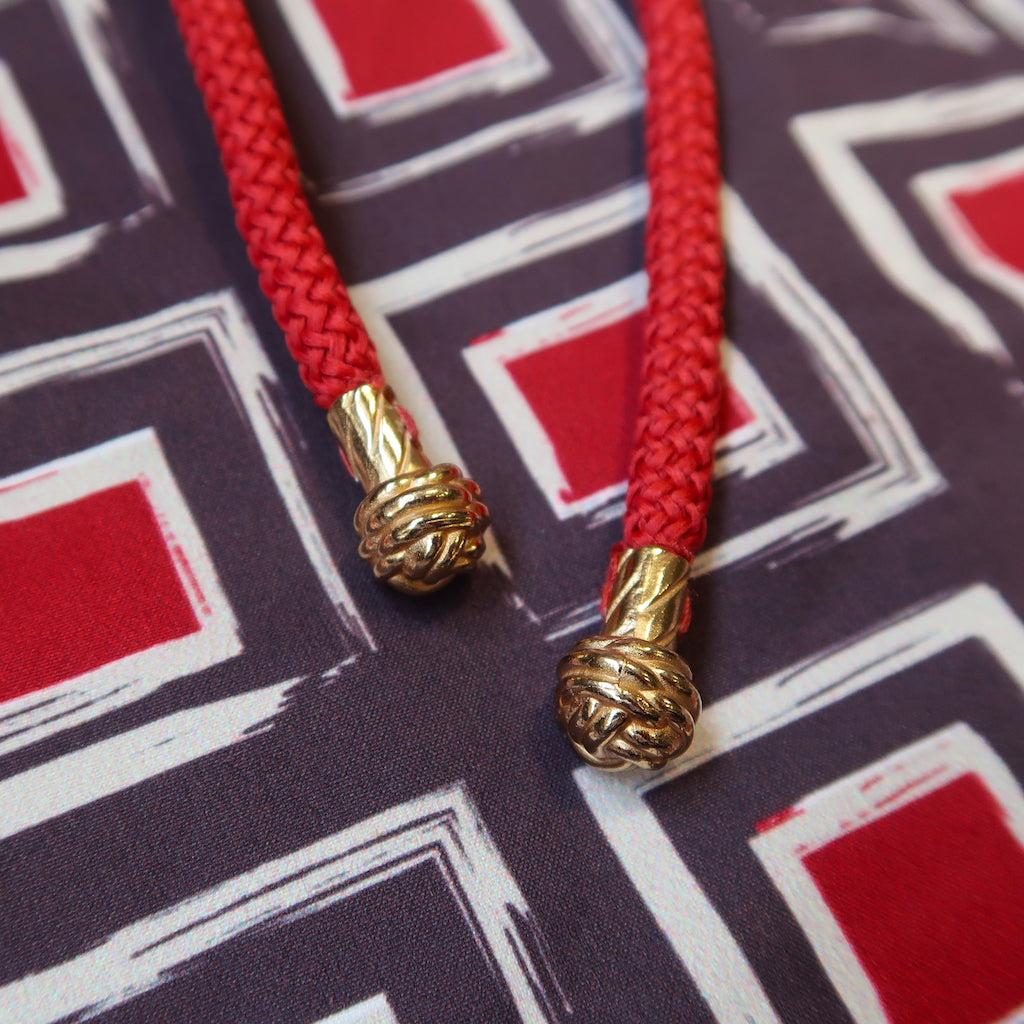 Handcrafted Monkey Fist Knot Aglets Inspired by Mazu (goddess of the sea).