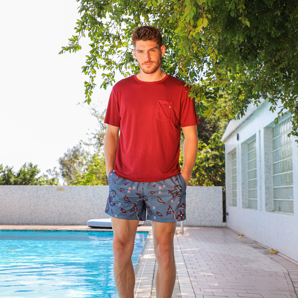 Distant Shores | Men's Swim Shorts & Trunks  and beach outfit.
