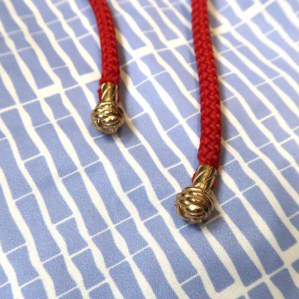 Handcrafted Gold Monkey Fist Knot Aglets Inspired by Mazu (goddess of the sea).